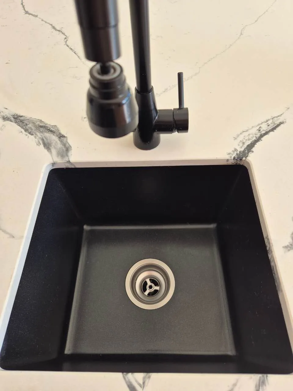 Coated kitchen basin after application